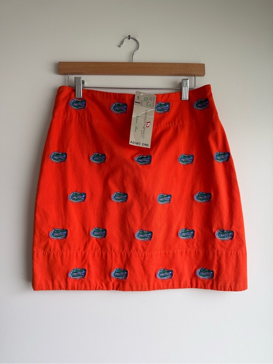Pennington & Bailes Dresses & Skirts - Penningtons Bright Orange Mini Skirt with Blue Embroidered Logos